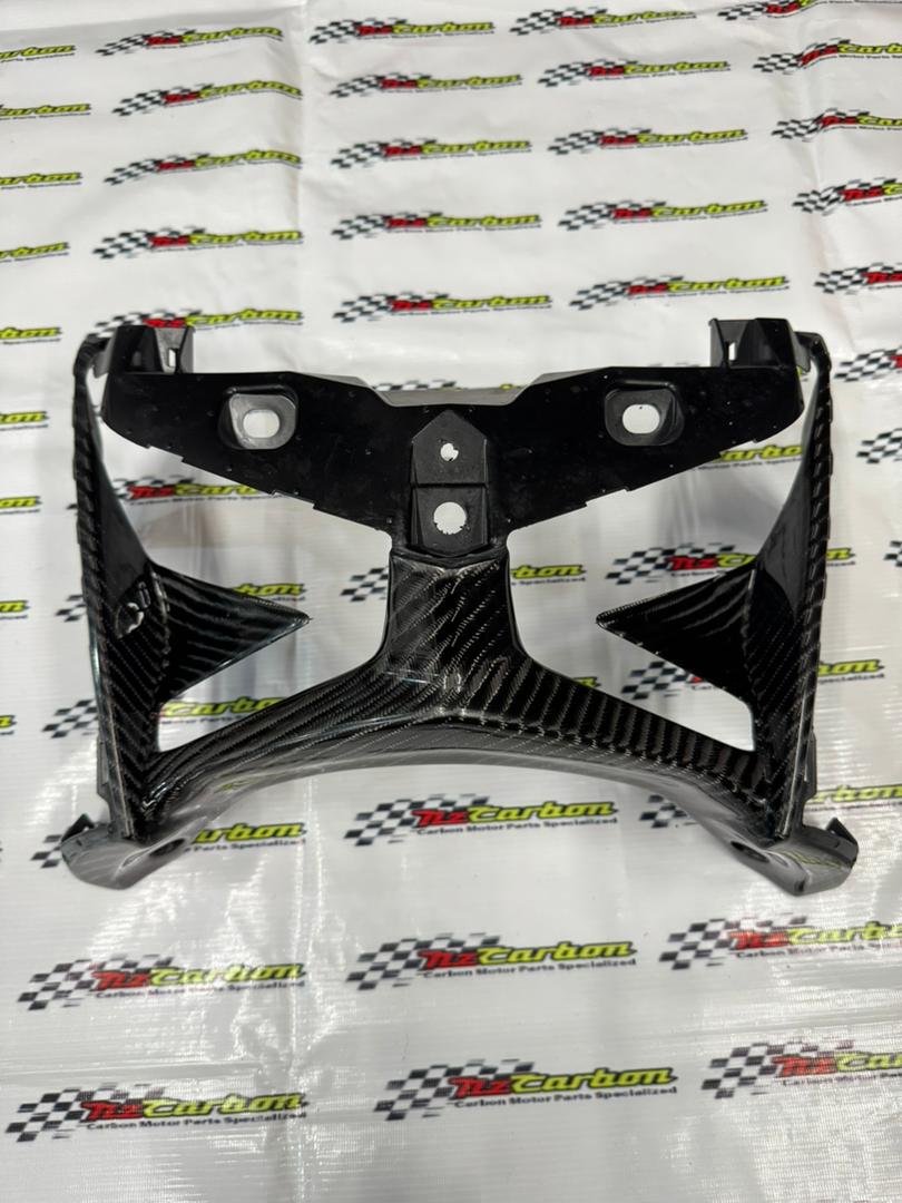 Big Twill Carbon Cover Headlamp for Yamaha XMAX V2 & V3 displayed on an NZ Carbon/NZ Motor Parts backdrop, showing its large-weave carbon pattern and glossy finish.