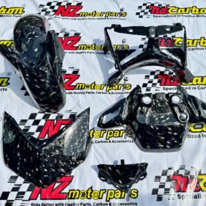 Forged Diamond Carbon Front Set for Yamaha XMAX V2, featuring five components—Front Cover Shield, Cover Headlamp, Front Fender, Windshield Connected Cover, and Front Signal Cover—displayed on an NZ Motor Parts background showcasing the forged carbon texture and glossy finish.