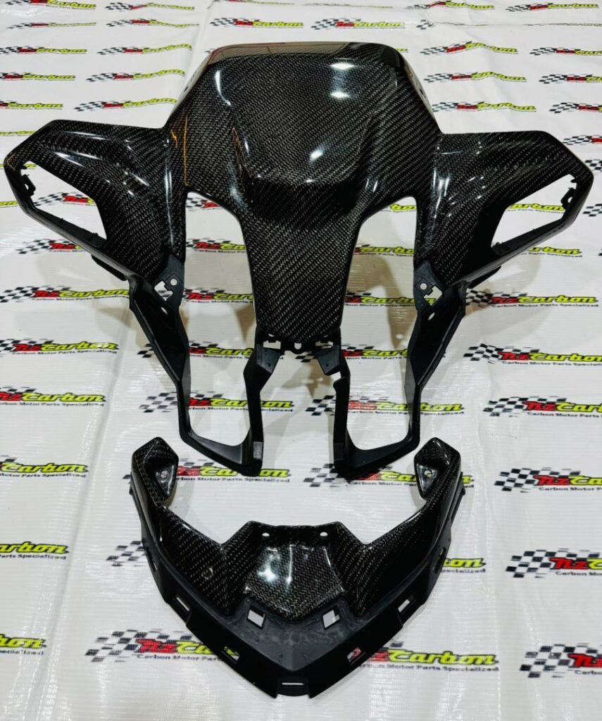 A complete NZ Carbon Front Signal Cover Set for Yamaha XMAX V3 in Black Twill Carbon, including the Front Signal Cover and Upper Front Signal Cover displayed on an NZ Motor Parts branded backdrop.