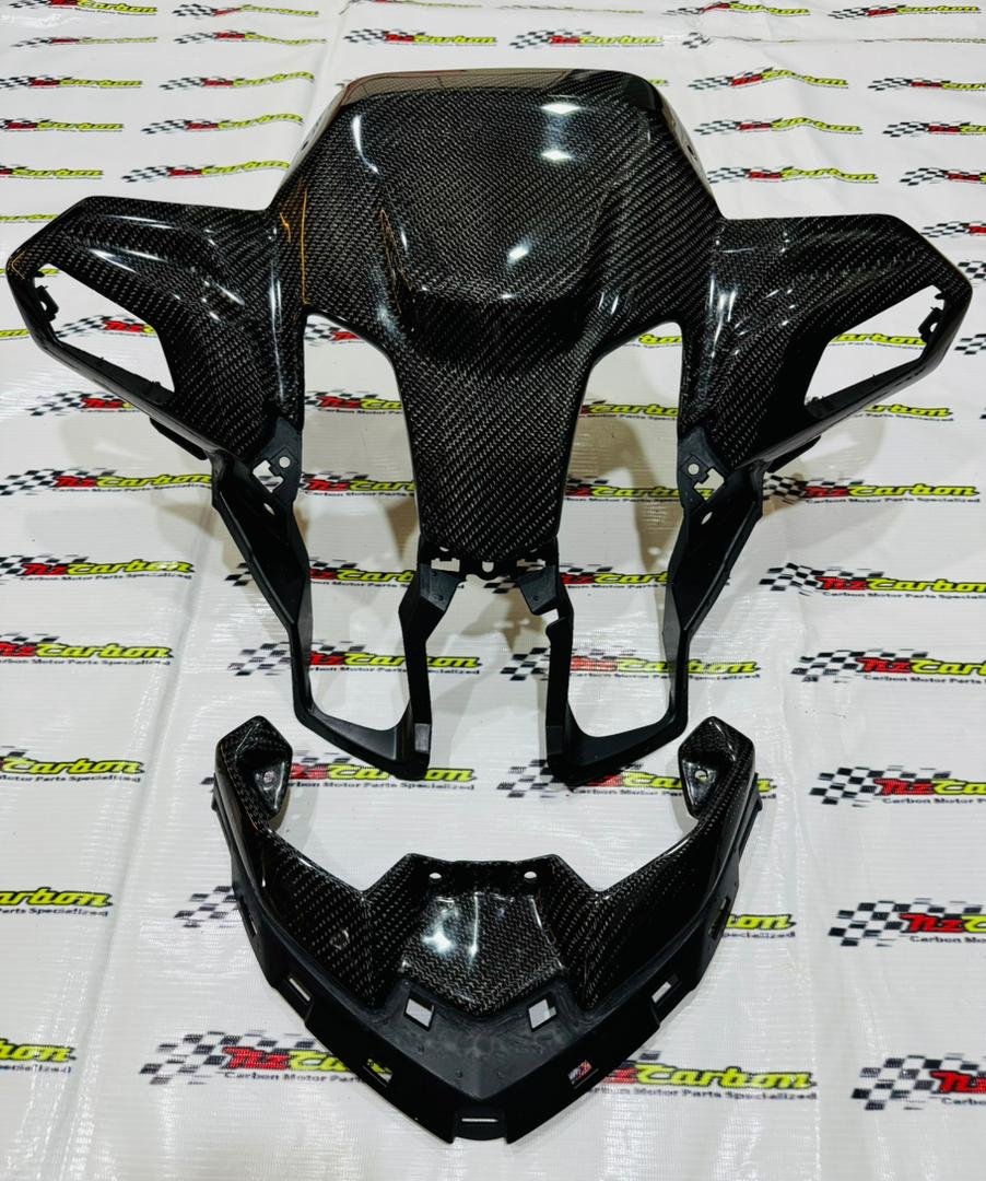 A complete NZ Carbon Front Signal Cover Set for Yamaha XMAX V3 in Black Twill Carbon, including the Front Signal Cover and Upper Front Signal Cover displayed on an NZ Motor Parts branded backdrop.