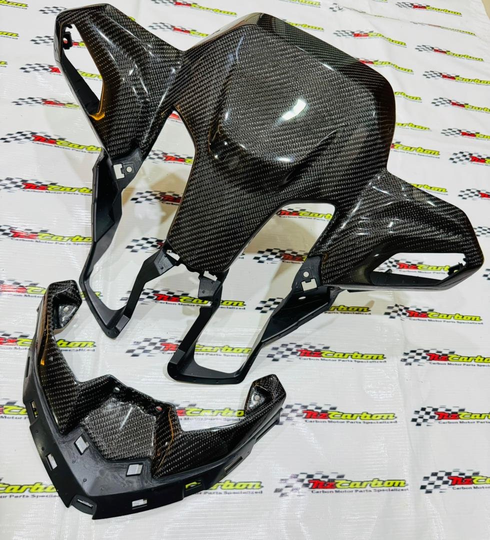 A complete NZ Carbon Front Signal Cover Set for Yamaha XMAX V3 in Black Twill Carbon, including the Front Signal Cover and Upper Front Signal Cover displayed on an NZ Motor Parts branded backdrop.