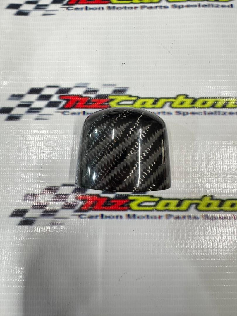 Big Twill Carbon License Plate Light Cover for Yamaha XMAX V2 & V3 displayed on NZ Carbon’s branded background, showing the large-weave carbon pattern and glossy handcrafted finish.