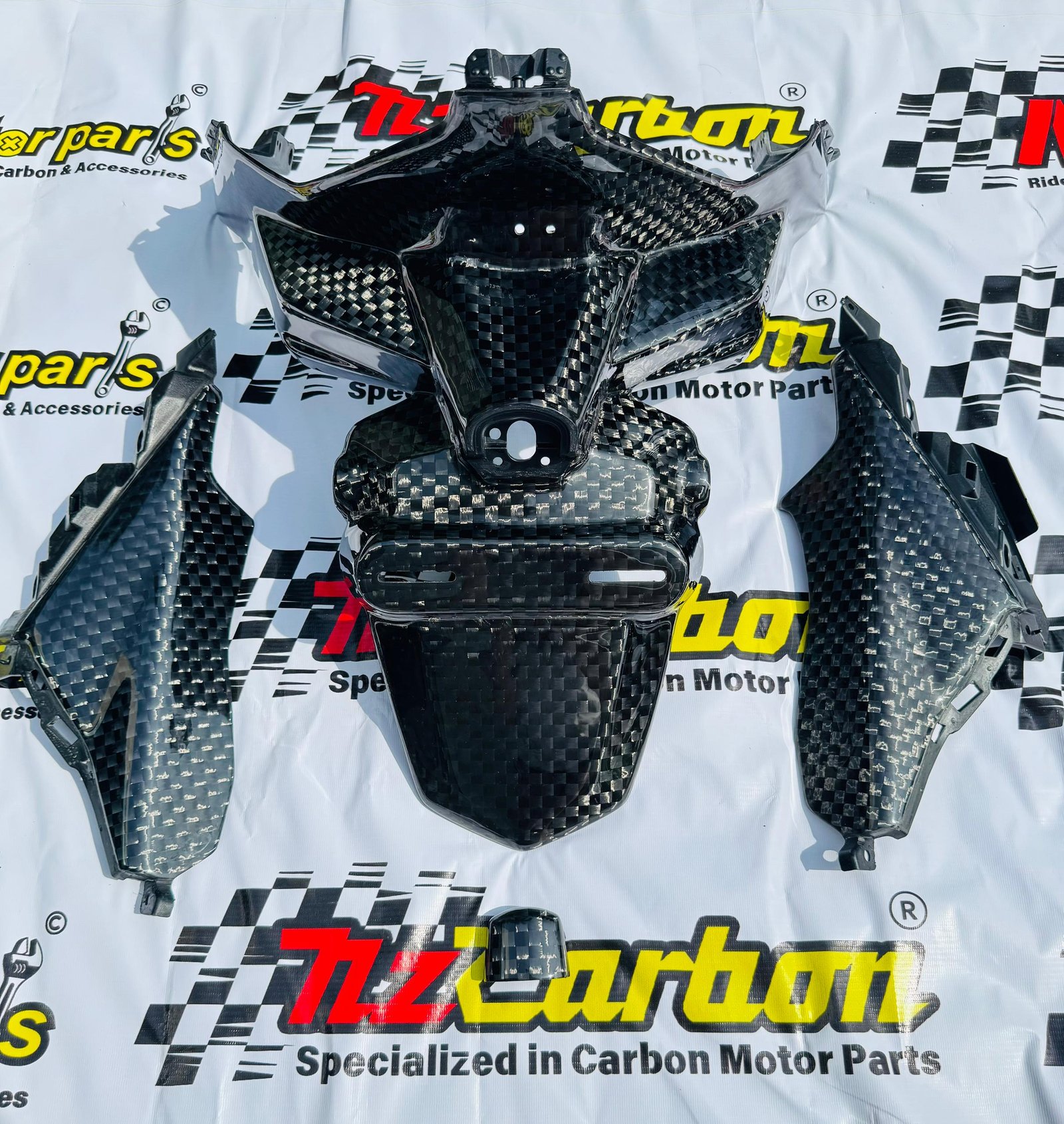 NZ Carbon F1 Rear Fender Set (Set Ekor) for Yamaha XMAX V2 & V3, including the Rear Fender, License Plate Light Cover, and Rear Tail Panel L/R, arranged on an NZ Motor Parts backdrop showcasing the F1 carbon weave.